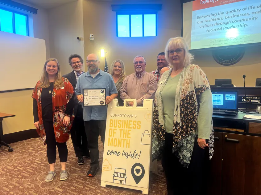 Connected Chiropractic accepting the Town of Johnstown Business of the Month award
